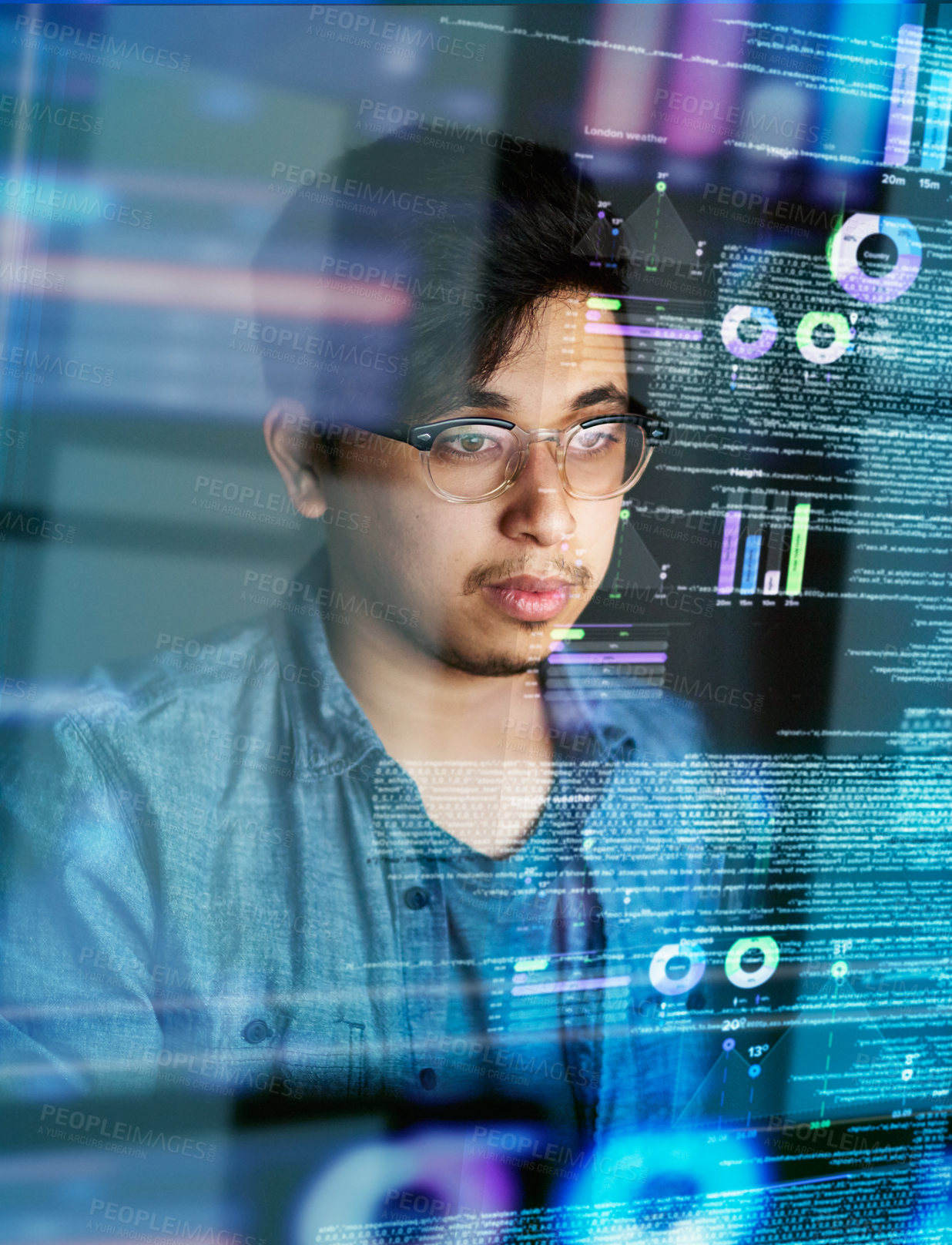 Buy stock photo Cropped shot of a young computer programmer looking through data