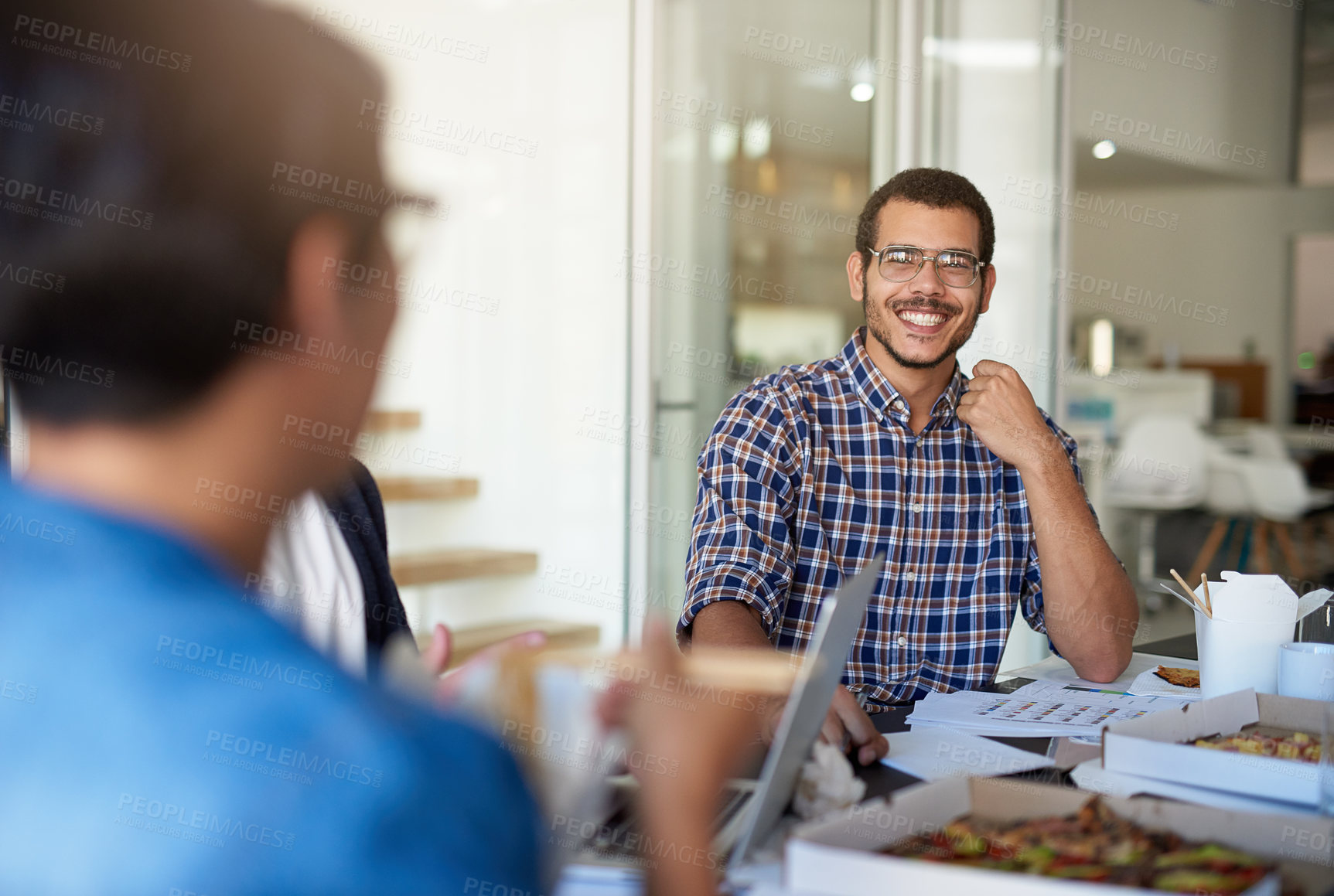 Buy stock photo Laugh, office and business man in meeting for planning, teamwork and collaboration. Creative agency, company and happy worker with documents, laptop and pizza in discussion, review and feedback