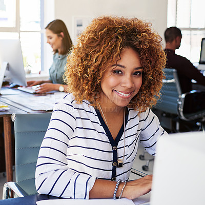 Buy stock photo Portrait of black woman in creative agency with smile, confidence and success at design startup. Happy designer in modern office, manager or team leader working at laptop desk with digital technology