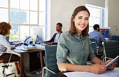 Buy stock photo Portrait of woman in creative agency with smile, confidence and success at design startup. Happy designer in modern office, manager or team leader working at laptop at desk with digital technology.