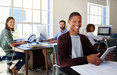 Buy stock photo Portrait of black man in creative agency with smile, confidence and success at design startup. Happy business people in modern office, manager or team leader working at desk with digital technology.