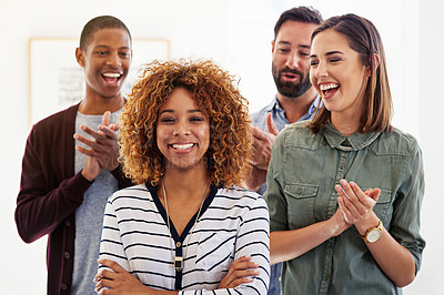 Buy stock photo Portrait of a team of colleagues standing in an office and clapping