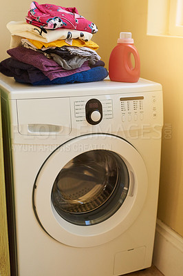 Buy stock photo Home, detergent and washing machine for clothes, laundry room for housework and cleaning fabric. Electric device, appliance and machinery for household chores, load and spin or rinse clothing.