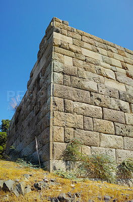 Buy stock photo Brick, architecture and ruins of building in outdoor field for cracked infrastructure or abandoned site. Broken, old property and solid concrete with vintage history, ancient wall design or culture