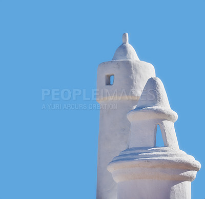 Buy stock photo Historical ventilation chimney on a roof isolated in blue sky background. Exterior view of a vintage or historic architecture airing system on a rural home or house rooftop in a village.