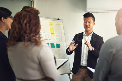 Buy stock photo Presentation, businessman with a chart and planning in a   modern workplace office together with a lens flare. Teamwork or collaboration, data review or ideas and diverse coworkers in a workshop