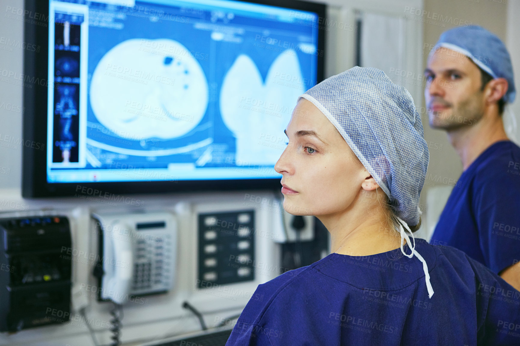 Buy stock photo Shot of two surgeons in a operating room