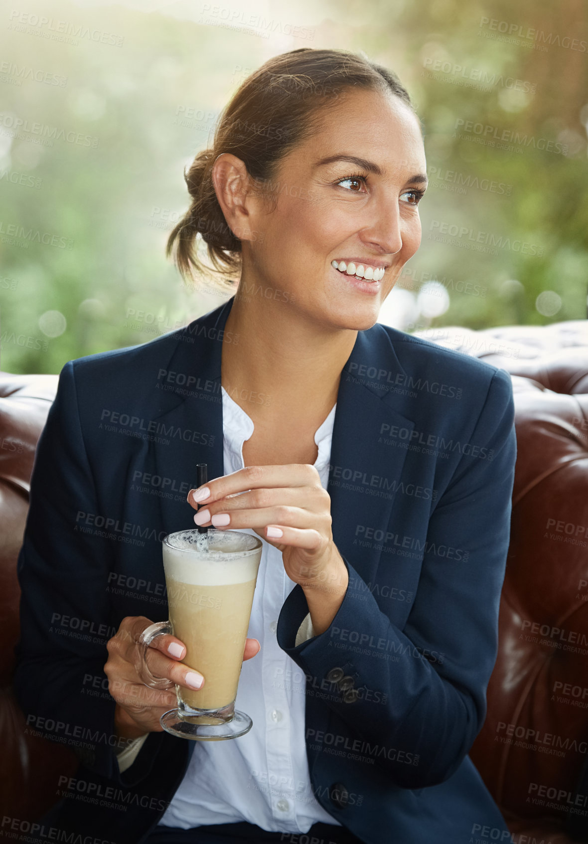 Buy stock photo Shot of a young businesswoman drinking coffee