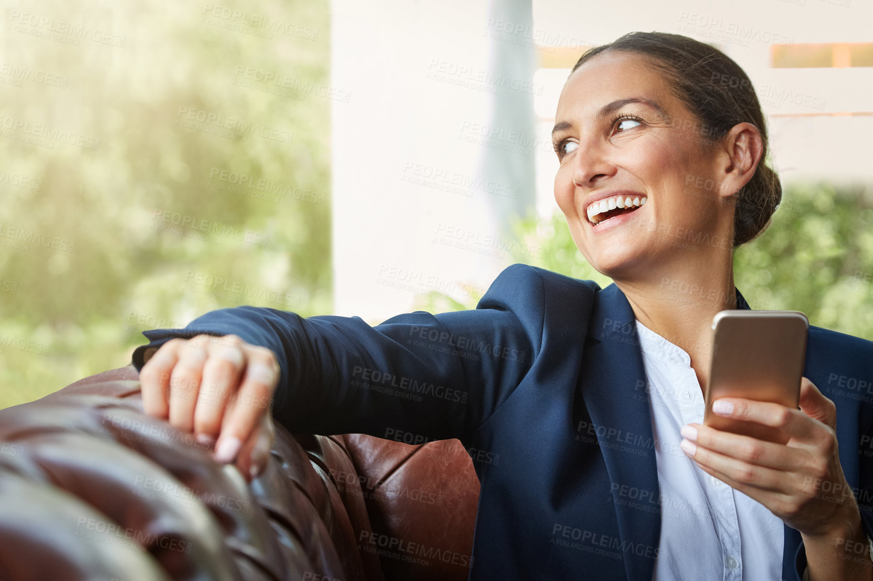 Buy stock photo Phone, laughing and businesswoman on sofa thinking with communication, texting or email for finance. Technology, professional and female financial manager with cellphone for contact on investment.