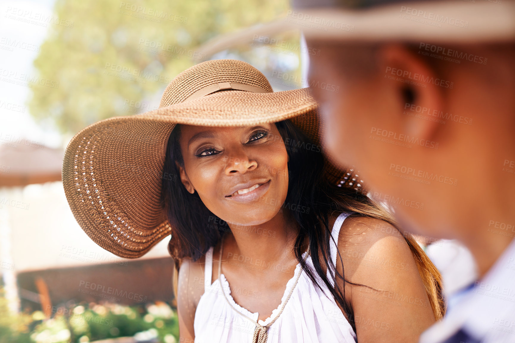 Buy stock photo Cropped shot of a mature couple talking in their frontyard