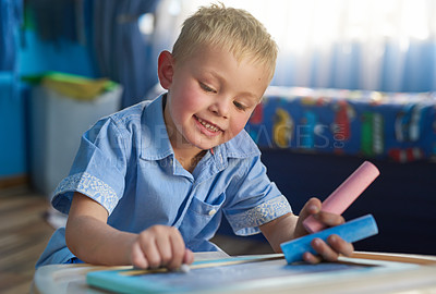 Buy stock photo Home, boy and writing on chalkboard, education and fun activity with creativity or artwork. Child development, house and kid with idea or smile with student or hobby for learning, drawing or carefree