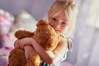 Buy stock photo Home, happy and girl hug with teddy, comfort with animal toys for childhood development for cuddle portrait. Support, bedroom with love for smile and fun, sweet children and caring in apartment