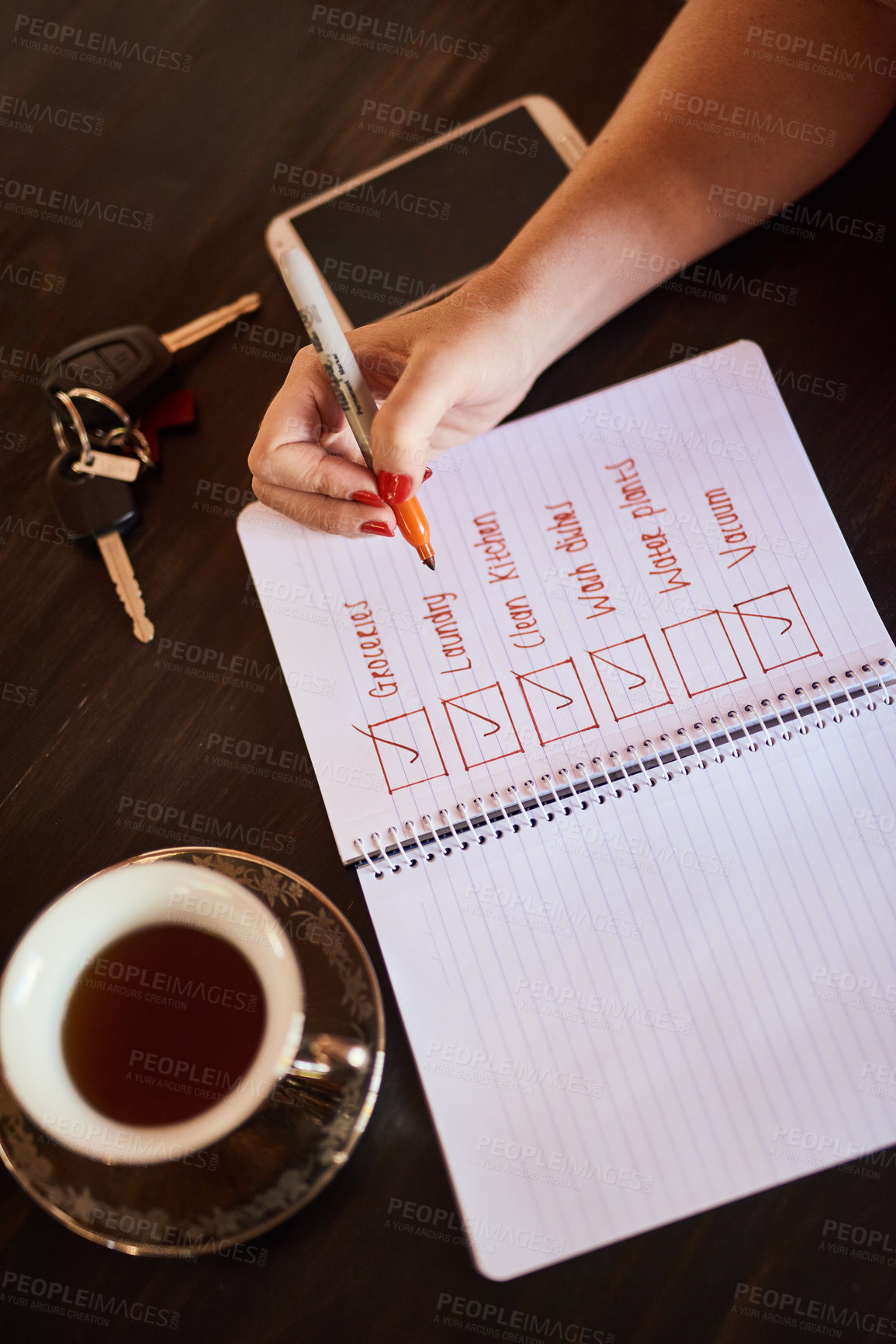 Buy stock photo Person writing, tick or hands with notebook and schedule for daily routine, checklist with coffee. Above, organise and to do list in home with notepad, page and book for planning to write a article