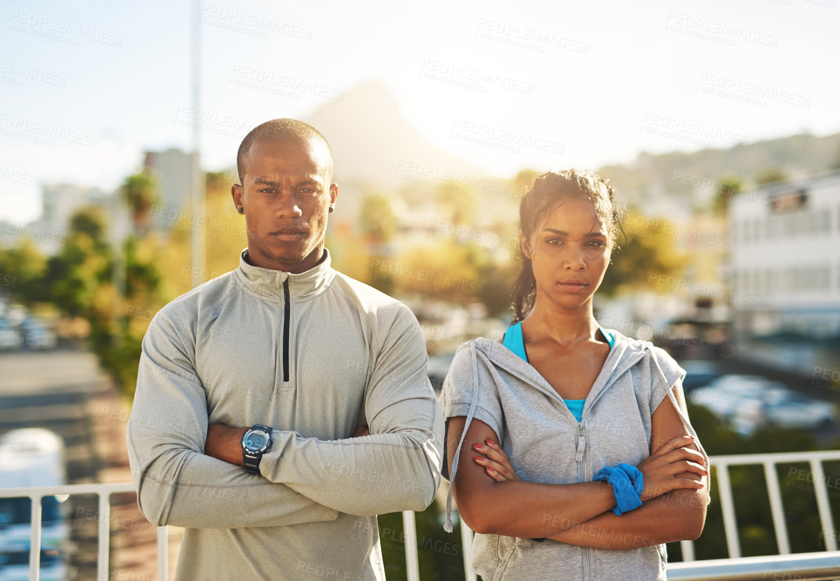 Buy stock photo Shot of a young sporty couple out for a workout