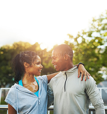 Buy stock photo Outdoor, couple and happy for fitness with hug on running break for workout, training and exercise. Relationship, people and smile with sweating for healthcare, wellness and wellbeing in Atlanta