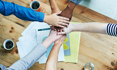 Buy stock photo Creative people, hands together and teamwork with top view in collaboration, documents or unity for project at office. Group piling above for community, agreement or meeting in startup at workplace