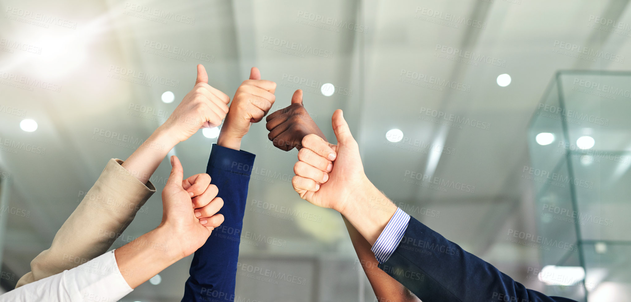 Buy stock photo Shot of a group of hands showing thumbs up in an office
