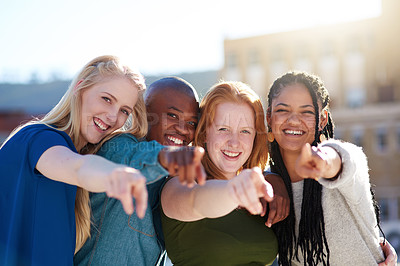 Buy stock photo Portrait of a group of people pointing their fingers forward