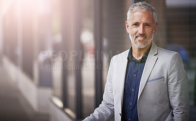 Buy stock photo Portrait of a mature businessman standing outside