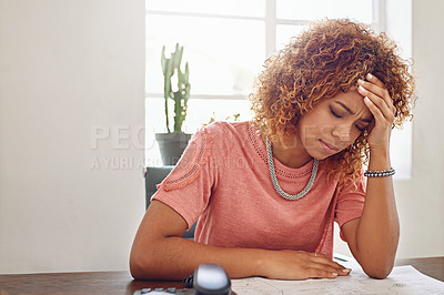 Buy stock photo Cropped shot of a businesswoman looking stressed out at her desk