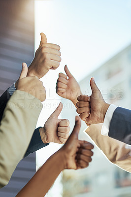 Buy stock photo Shot of a group of hands showing thumbs up