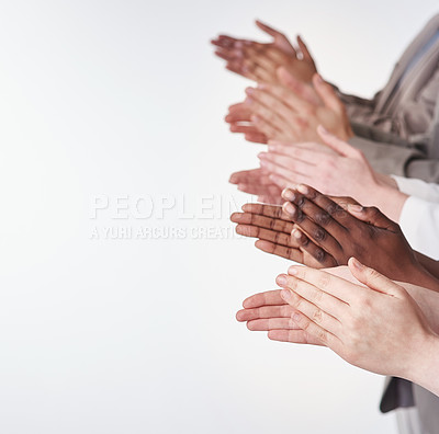 Buy stock photo Shot of a group of people clapping their hands together