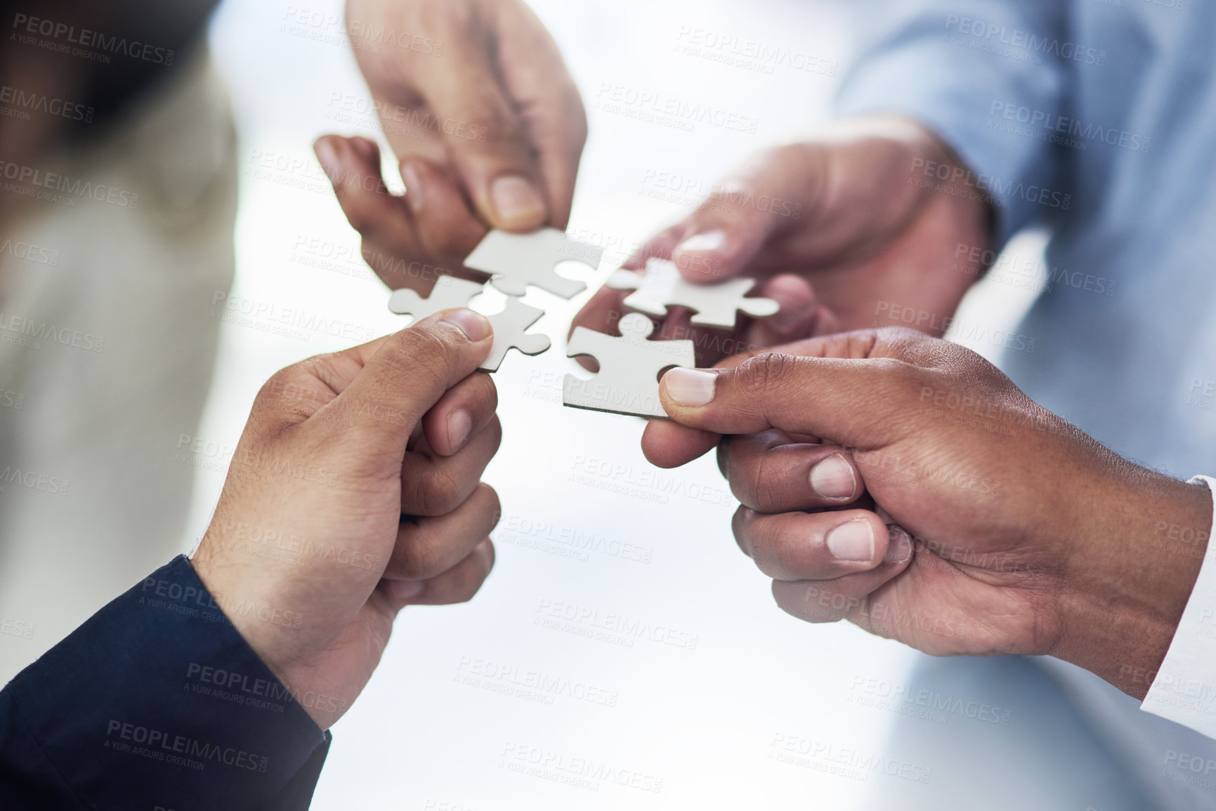 Buy stock photo Teamwork, business and hands of people with puzzle for unity or collaboration with joint effort for project. Group, diversity and pieces together for planning or partnership, union and engagement.