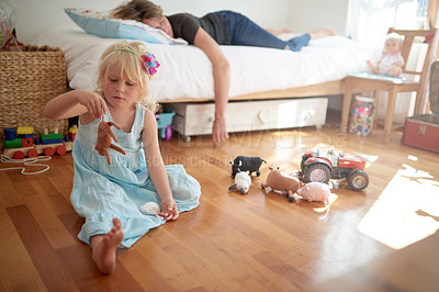 Buy stock photo Tired mom, sleeping and girl playing with toys on floor lonely, neglect and fatigue at home. Parenting, fail and mother with insomnia in bed for afternoon nap in house with curious bored daughter