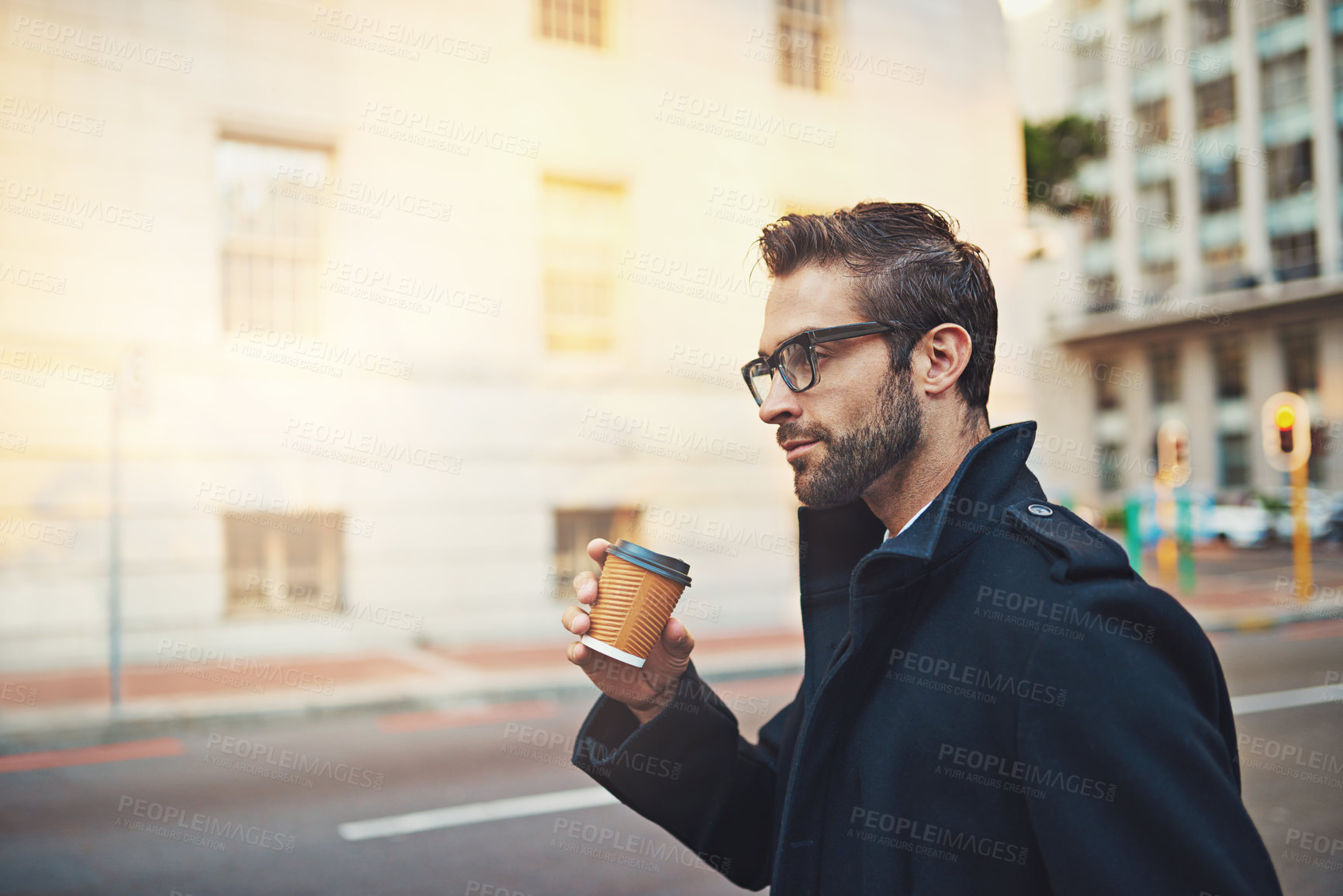 Buy stock photo Shot of a young businessman in the city