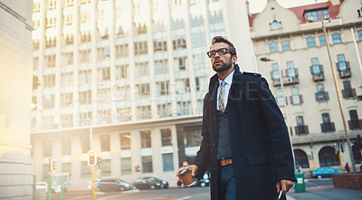 Buy stock photo Walking, coffee and business man in city for commute, travel and confidence for profession in morning. Urban, male person or lawyer on road for employment location, espresso and beverage in hurry