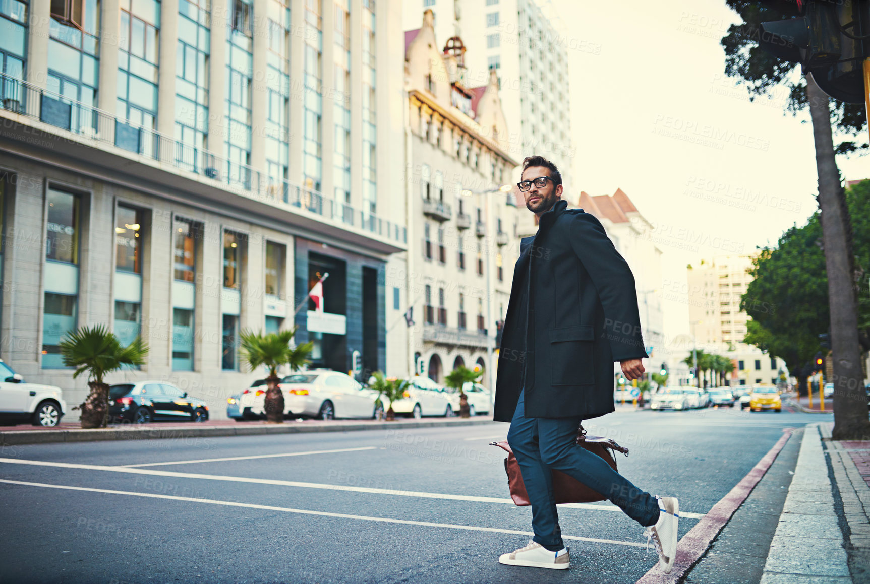 Buy stock photo Fashion, commute and man in city, stylish clothes and pedestrian in street, startup owner and urban town. Person, glasses and guy in road, walking and New York with portrait, buildings and travel