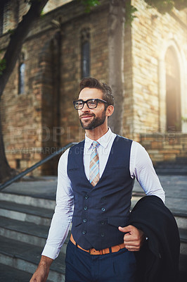 Buy stock photo Shot of a stylish young man in the city