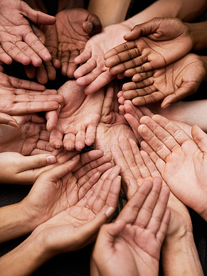 Buy stock photo Shot of a group of hands held cupped out together