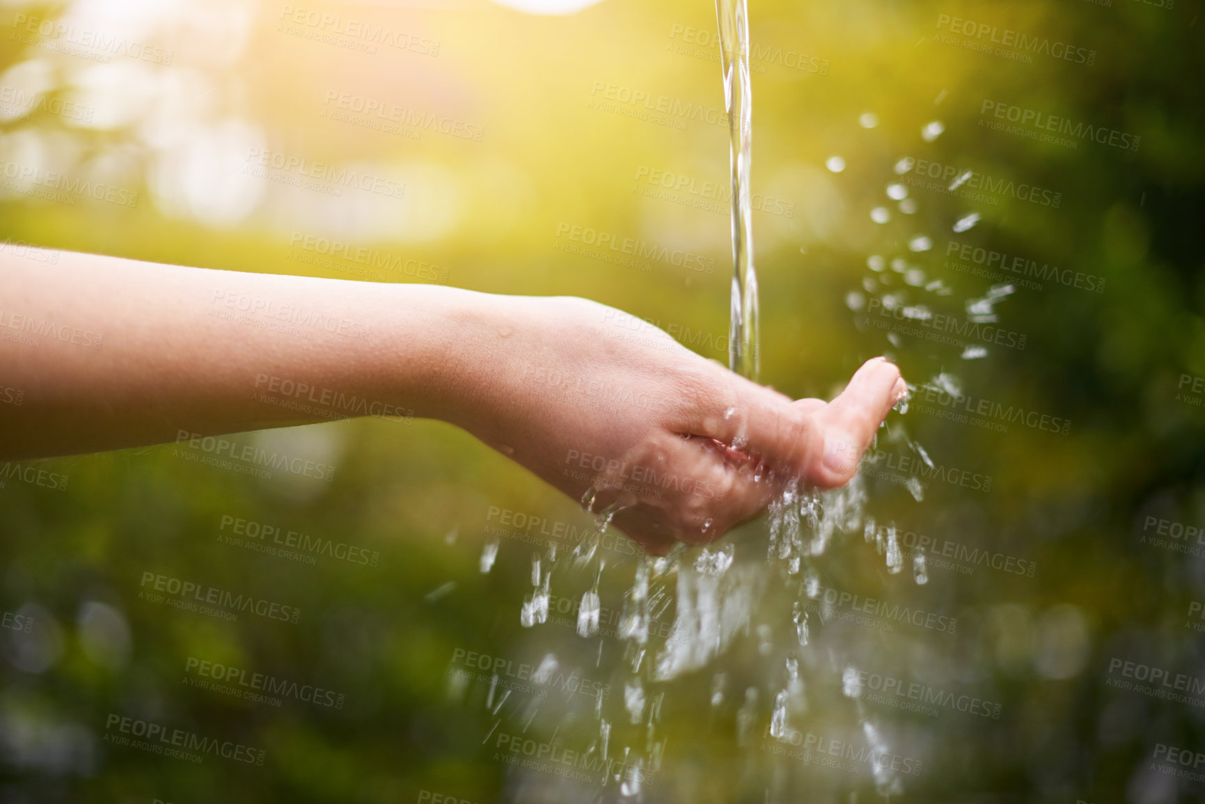 Buy stock photo Hand, hygiene or water with splash or stream for awareness, resources on earth in park. Closeup, palm and liquid on skin for renewable or sustainable nature with washing and clean for planet