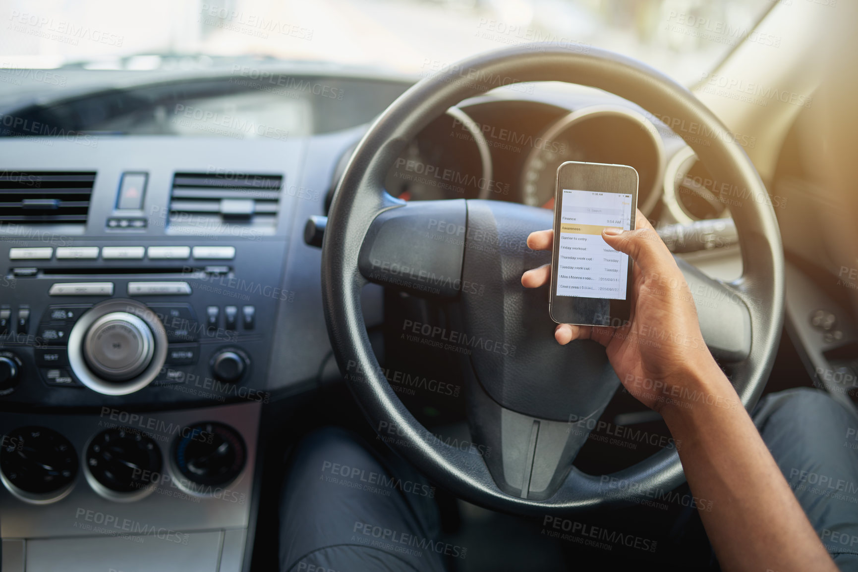 Buy stock photo Phone, texting and driving with hands of person on steering wheel with scroll, danger and risk. Road safety, awareness and driver in car with smartphone, distraction and attention with auto insurance