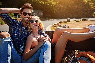 Buy stock photo Sunglasses, journey and happy couple relax on road trip for vacation, holiday or outdoor. Man, woman and holding hands in transport for tourism, travel and together for love in back of pickup truck