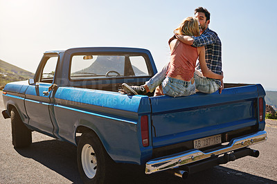 Buy stock photo Car, couple or back with kiss for road trip, holiday or outdoor vacation together on mountain. Man, woman or lovers with truck or affection in sunshine for romance, love or travel adventure in nature