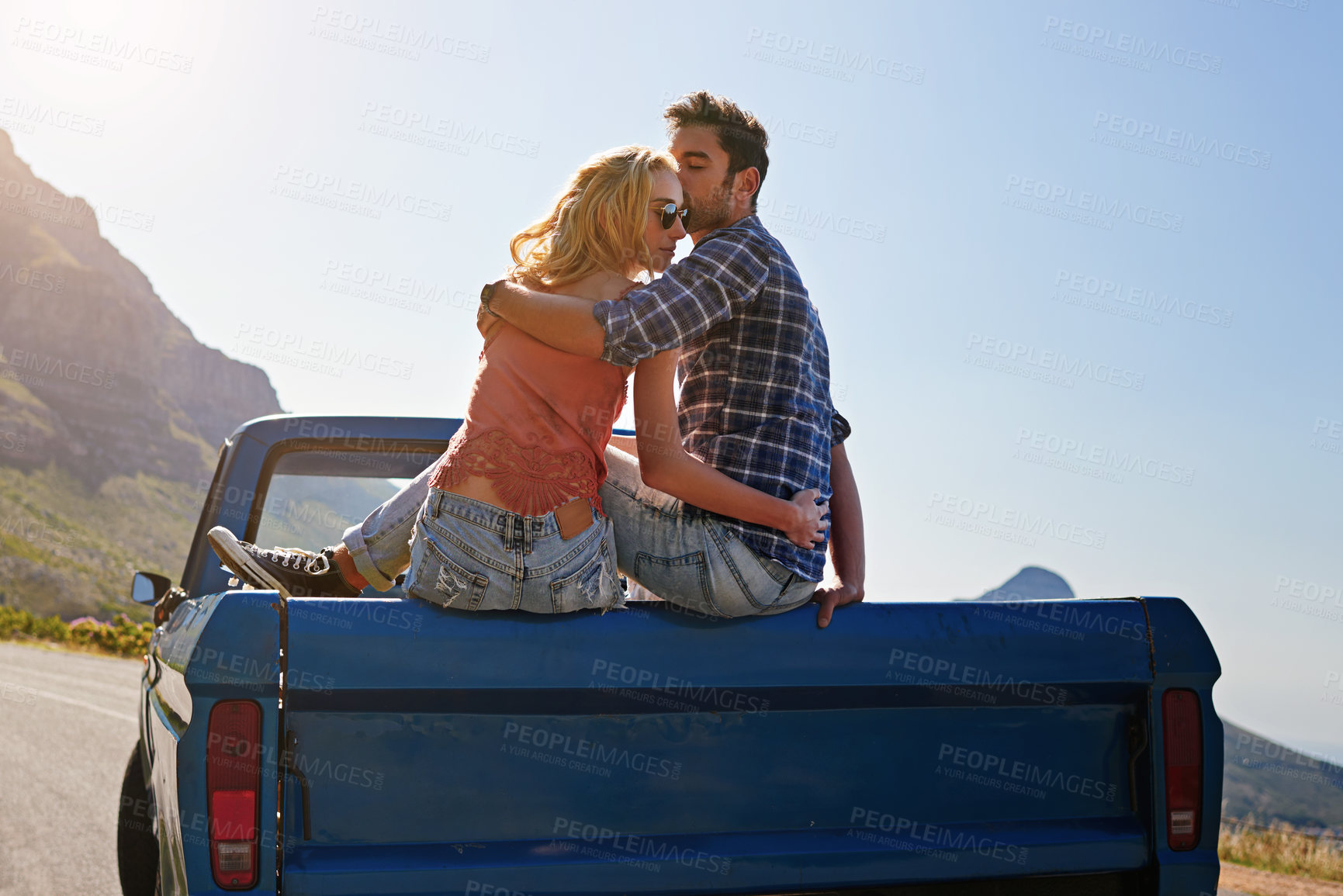 Buy stock photo Car, couple and back with hug for road trip, adventure or summer vacation in nature. Man, woman or lovers with kiss in vehicle or trunk for outdoor holiday, weekend or journey together on mountain