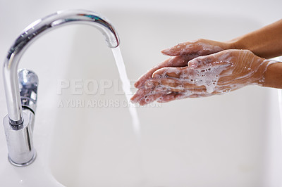 Buy stock photo Woman, soap and washing hands in bathroom for hygiene, skincare or bacteria in home with wellness. Person, foam and disinfection for germ protection, routine or healthcare with running water by sink 