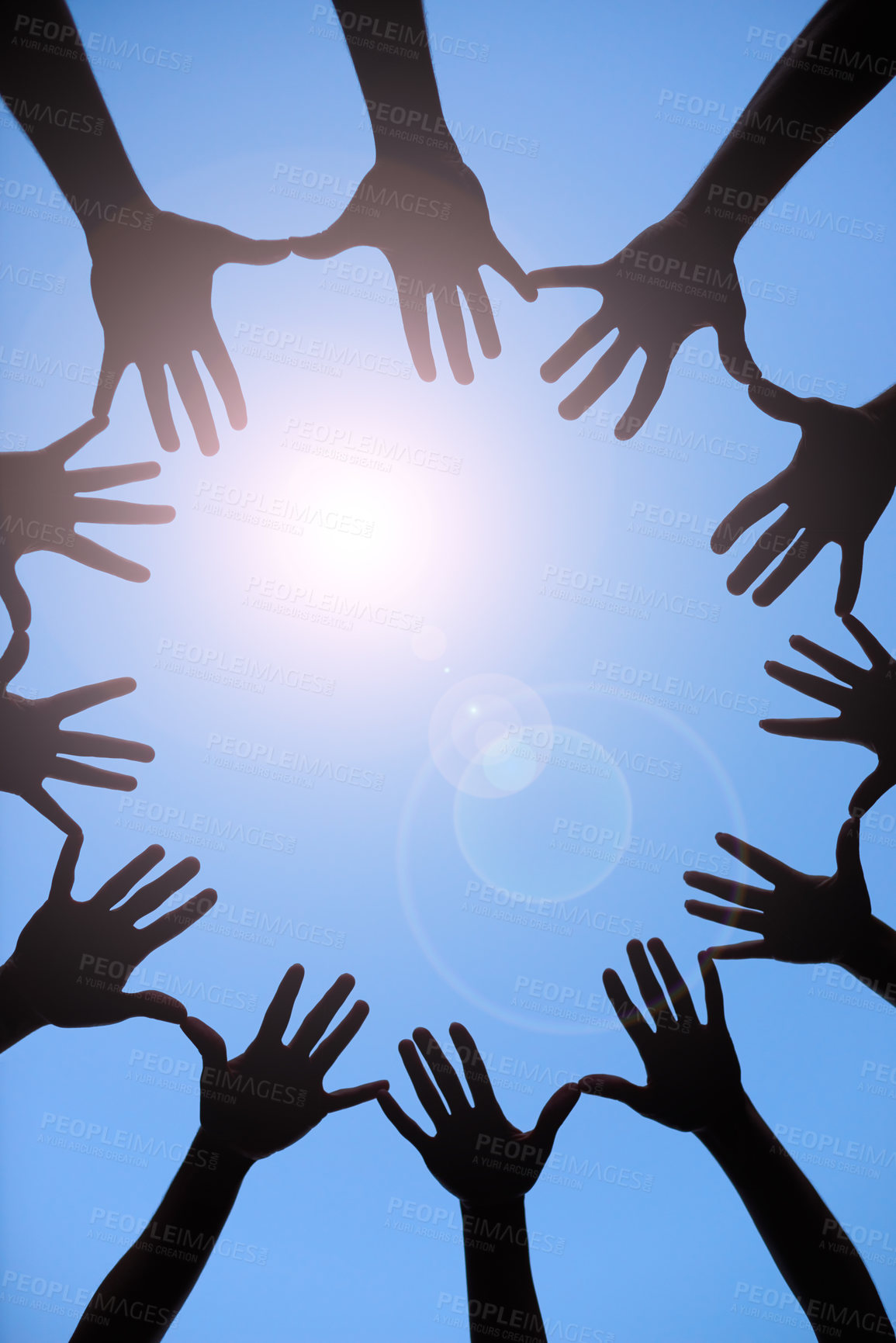 Buy stock photo Hands, together or circle with blue sky for diversity, community and collaboration. Group, arms up and palms out with summer silhouette for unity, teamwork and trust between friends or colleagues