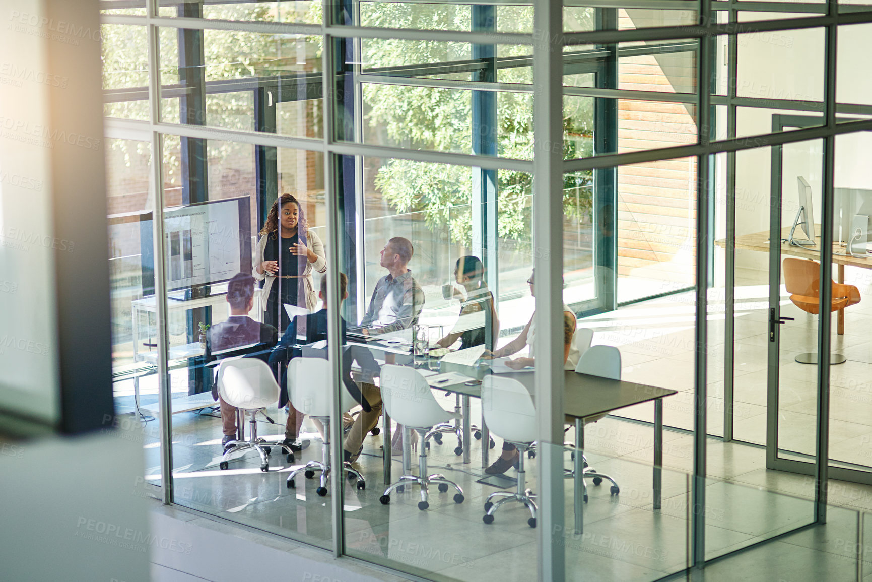Buy stock photo Business, people and tech in office for conference, brand management and feedback chart. Woman speaker, team or corporate presentation in boardroom for company growth plan in group performance review