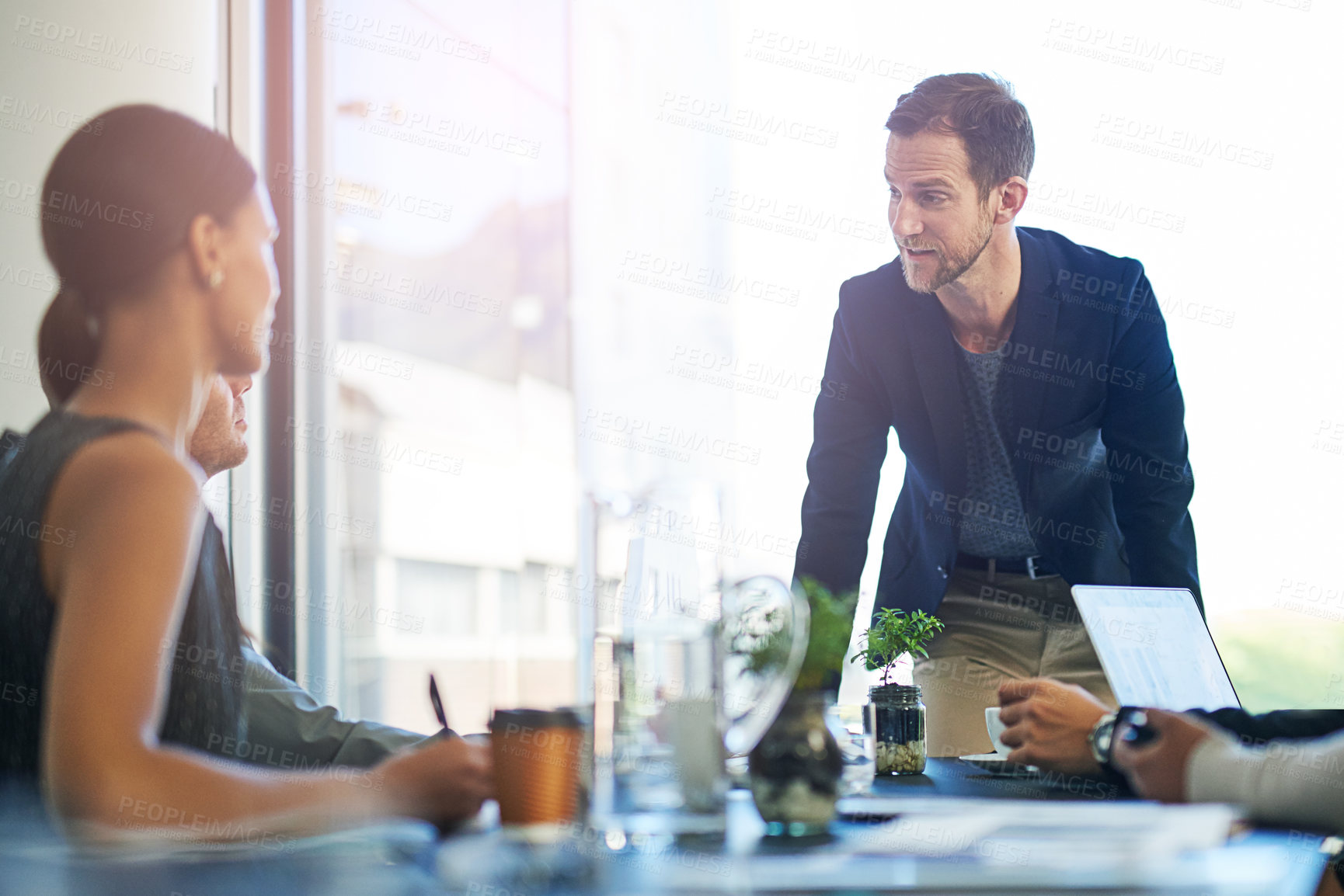 Buy stock photo Meeting, presentation and man in office with management, discussion and proposal for team growth. Ideas, development and business people in conference room with advice, strategy or financial report