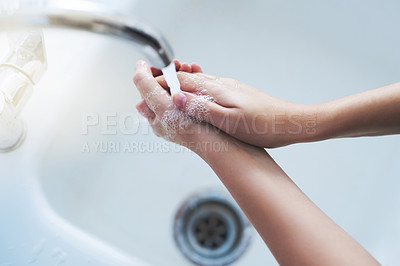 Buy stock photo Person with water, cleaning hands and hygiene in bathroom, skincare and sustainability with disinfection from germs or bacteria. Health, wellness and handwashing, soap with tap and sink at home