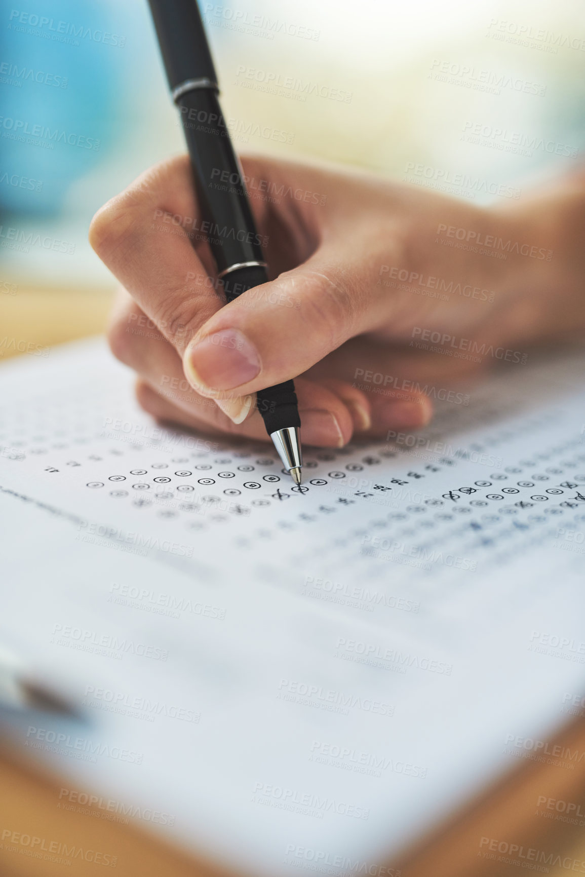 Buy stock photo Woman, hand and writing a quiz with choice on clipboard for exam assessment, test and closeup of answer sheet. Paperwork, student and form with cross for learners license, education and scholarship