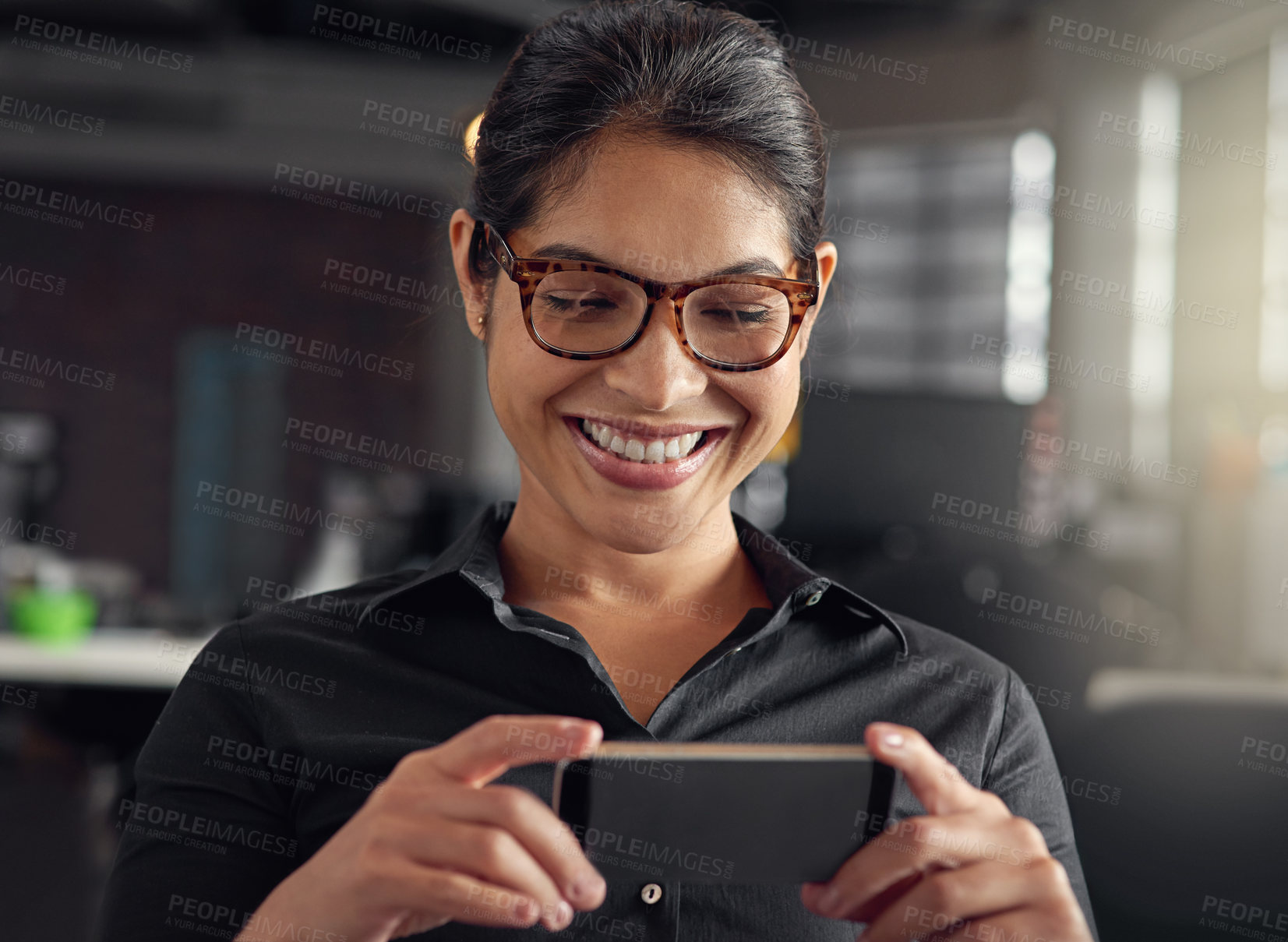 Buy stock photo Shot of a smiling businesswoman working in an office