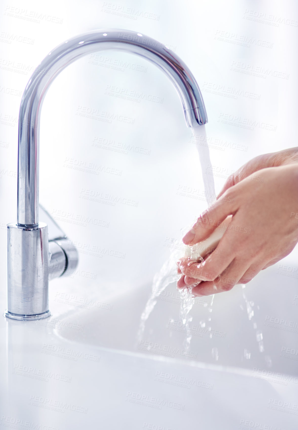 Buy stock photo Soap, tap and washing hands in bathroom for hygiene, skincare and germ protection or wellness at home. Person with water splash and product in palm for cleaning of body bacteria or health at basin 