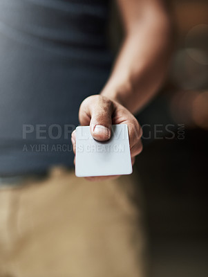 Buy stock photo Shot of a man holding out a credit card