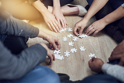 Buy stock photo People, training and hands with puzzle on table for problem solving, learning and integration of strategy. Diversity, team and support with jigsaw for creative teamwork, interaction and collaboration