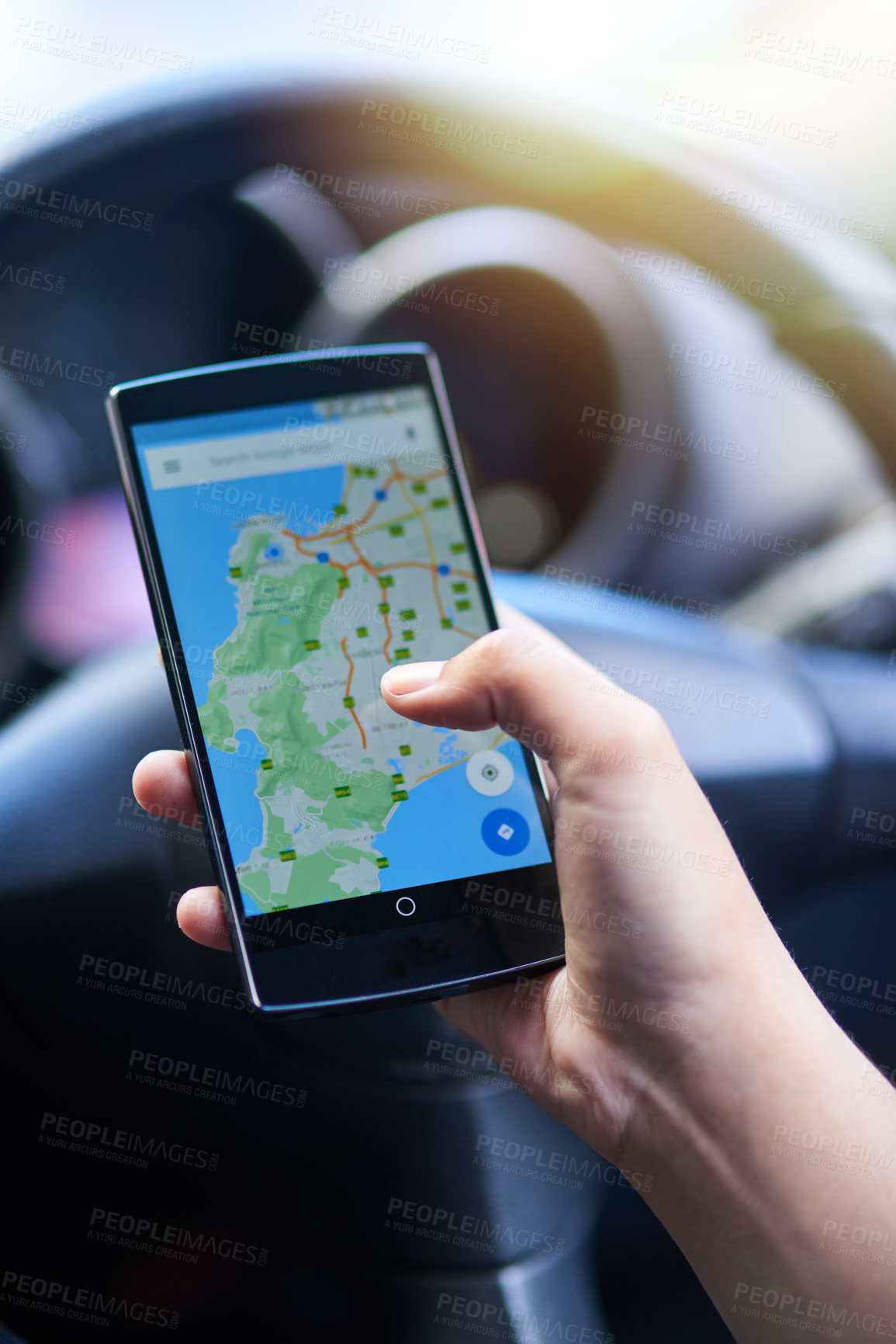 Buy stock photo Shot of a person in a car using their phone to find directions
