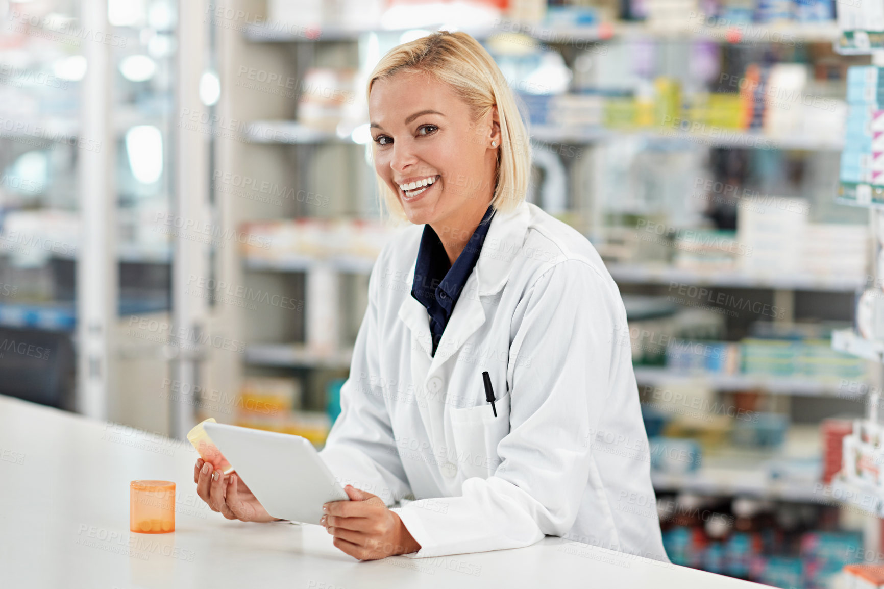 Buy stock photo Tablet, portrait and woman in pharmacy with smile, healthcare and prescription drugs in store. Health, professional service and pharmacist at counter with medical advice on digital app for telehealth